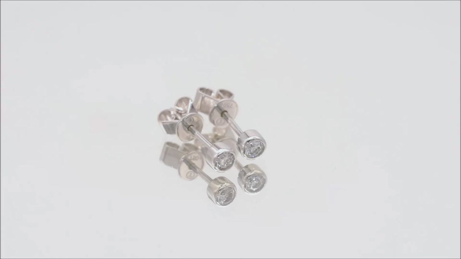 Ohrstecker Solitär mit 0,11ct Diamanten in 750 (18K) Weißgold Zargenfassung Video