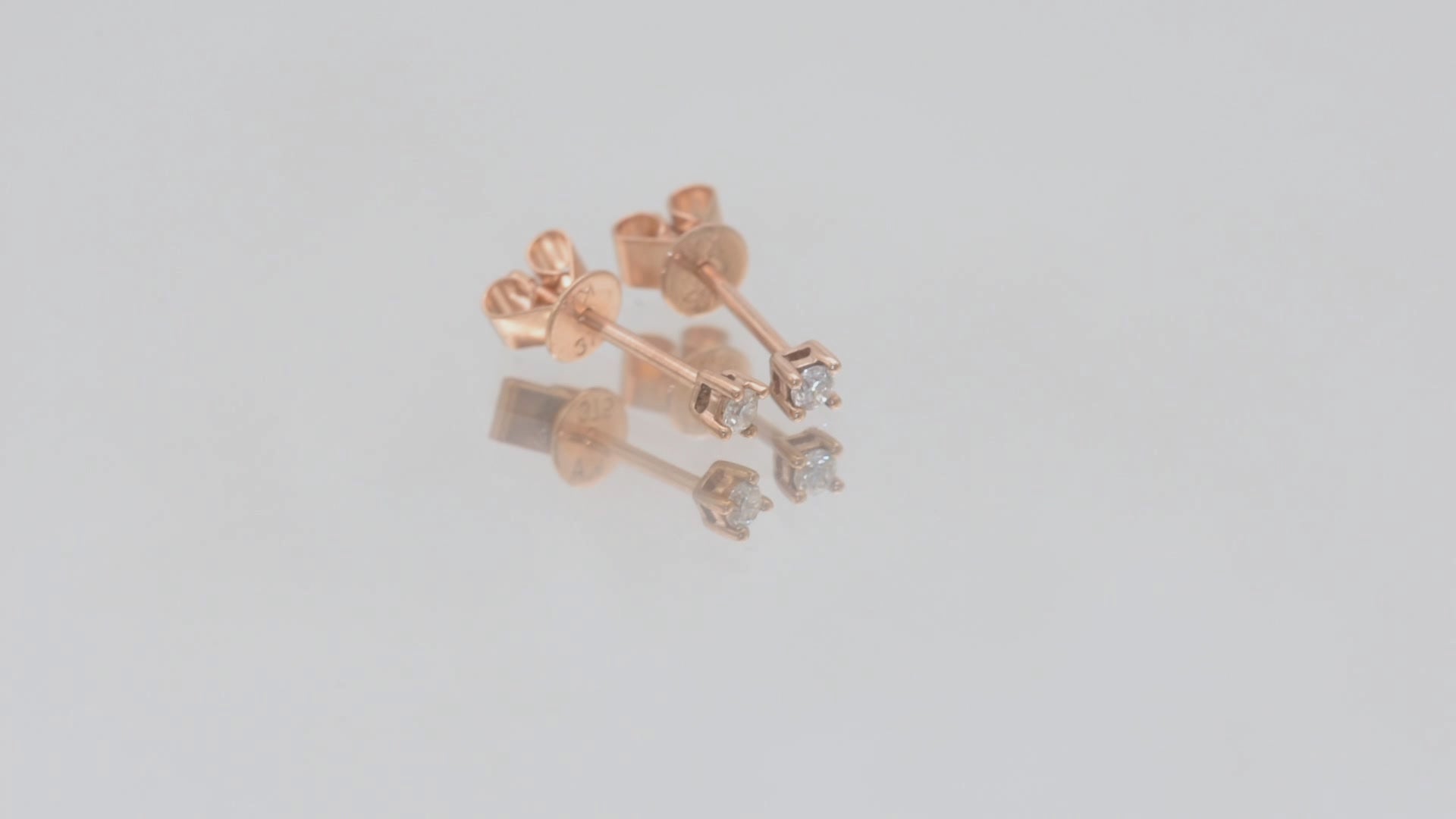 Ohrstecker Solitär mit 0,05ct Diamanten in 375 (9K) Rotgold 4-Krappenfassung Video